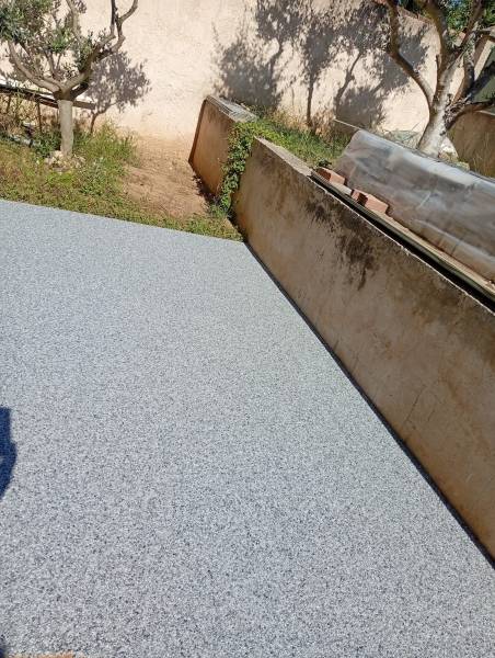 Rénovation d'une terrasse en tapis de marbre